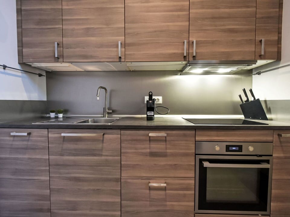 Cabinetry, Kitchen, Wood, Furniture, Kitchen Appliance, Countertop, Flooring, Interior Design, Kitchen Sink, Major Appliance