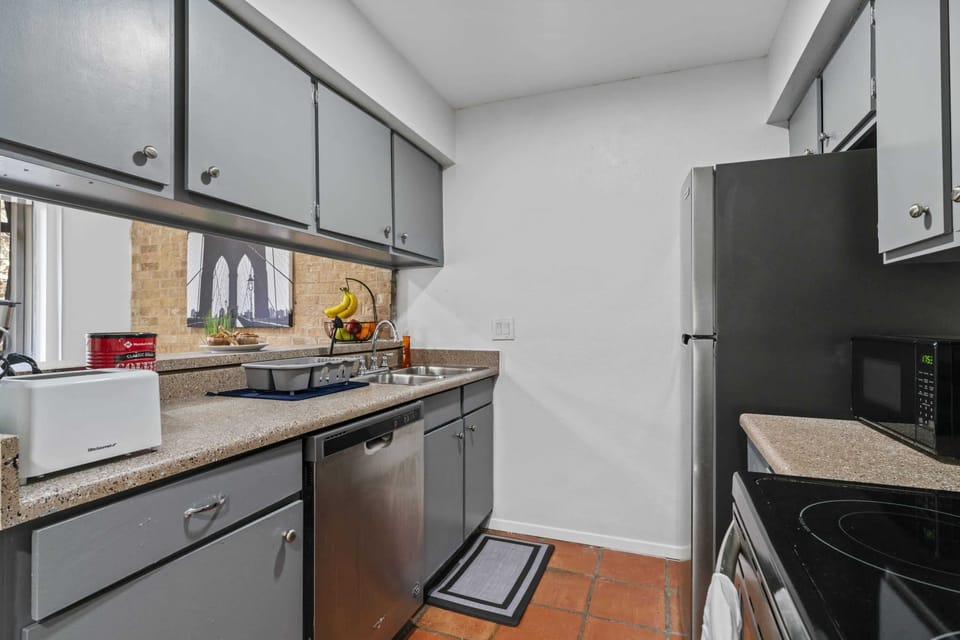 Kitchen with barstool area that overlooks the dining area
