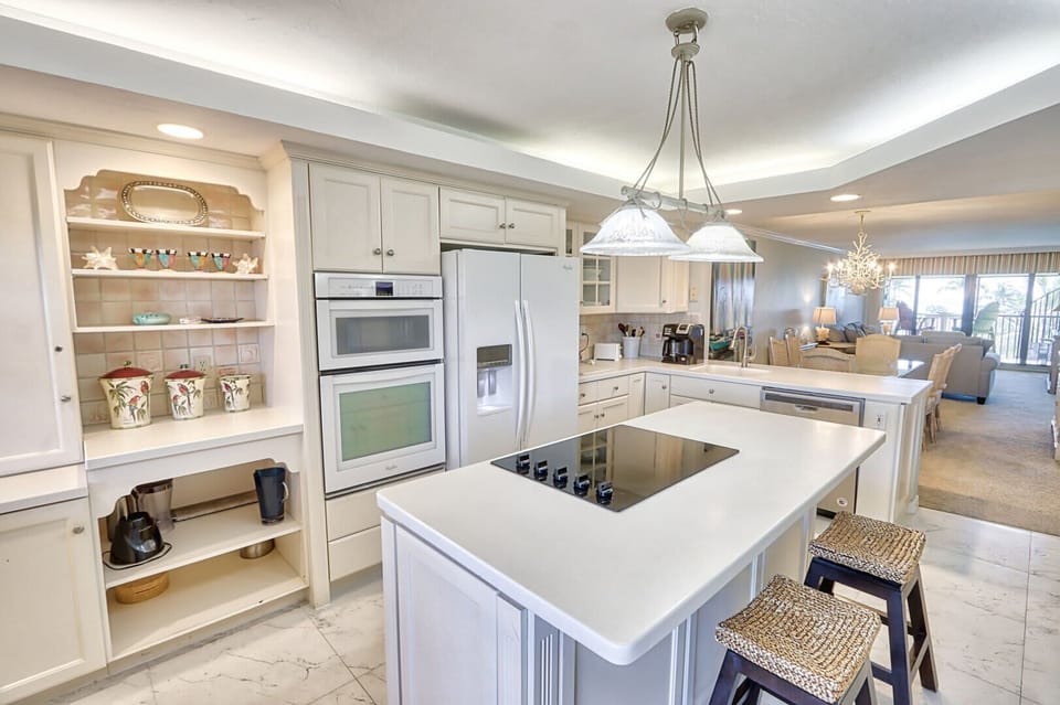 Kitchen with island and seating.