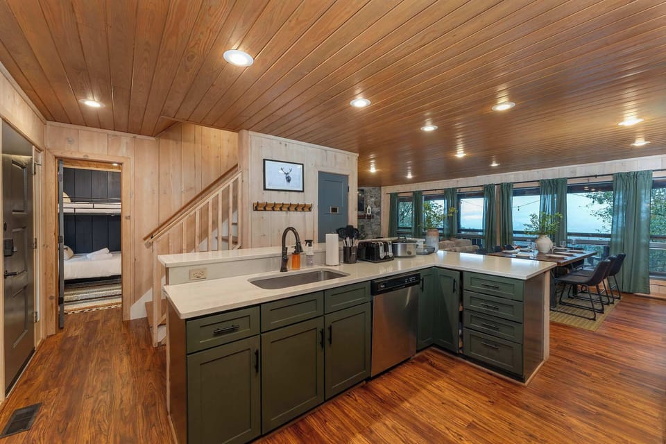 Features tons of cabinetry, offering plenty of storage space for all your needs.