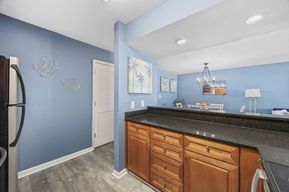 Breakfast Bar opening into Dining and Living Areas