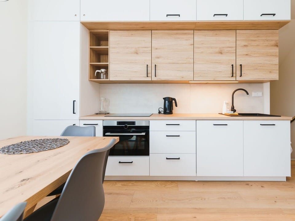 Furniture, Cabinetry, Countertop, Kitchen, Flooring, Interior Design, Kitchen Appliance, Wood, Floor, Drawer