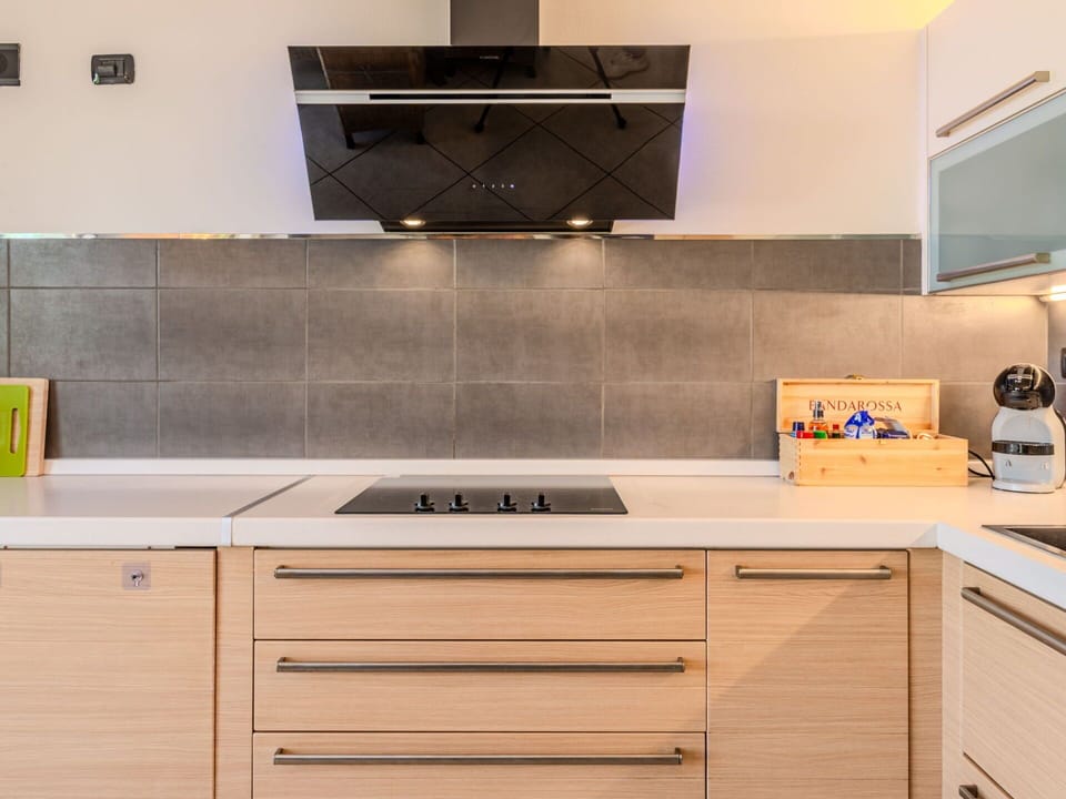 Kitchen, Kitchen Appliance, Countertop, Cabinetry, Furniture, Major Appliance, Flooring, Interior Design, Kitchen Stove, Wood