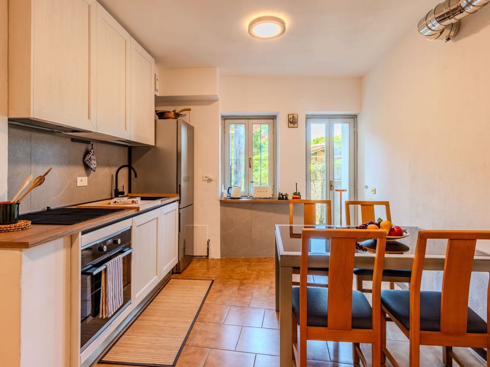 Kitchen, Countertop, Interior Design, Flooring, Furniture, Wood, Kitchen Appliance, Major Appliance, Ceiling, Floor