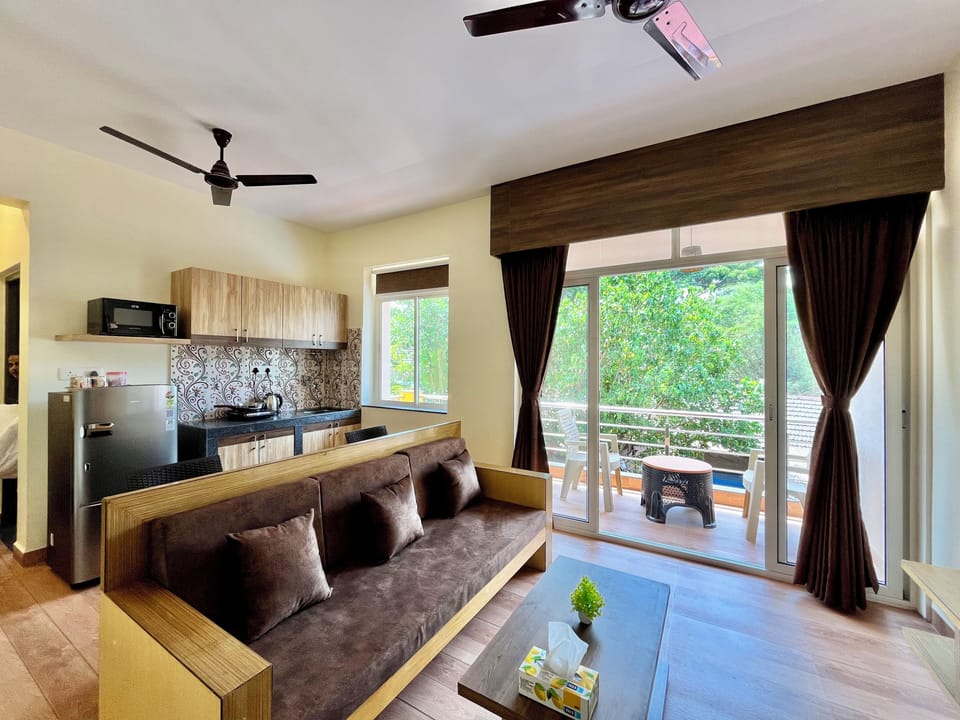 Superior Room | Living area | 32-inch Smart TV with cable channels