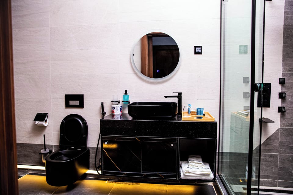 Presidential Penthouse, City View | Bathroom | Hair dryer, slippers, towels, soap