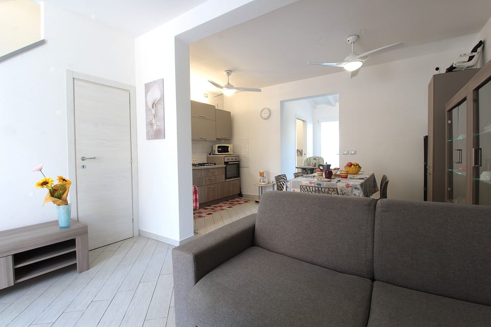 House, Balcony, Garden View | Living area | 32-inch flat-screen TV with cable channels