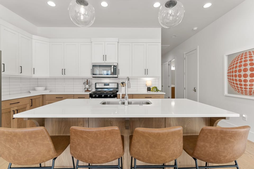 Townhome, 4 Bedrooms | Private kitchen | Coffee/tea maker, fridge, oven, toaster