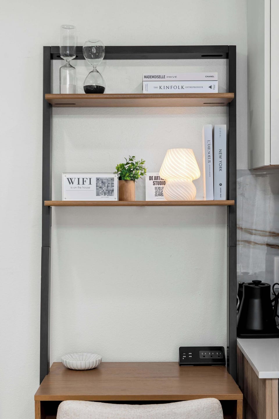 Need a quiet space to wrap up some work or get some studying done? This dedicated work station includes a desk, chair, and additional electrical outlets to help your productivity. 