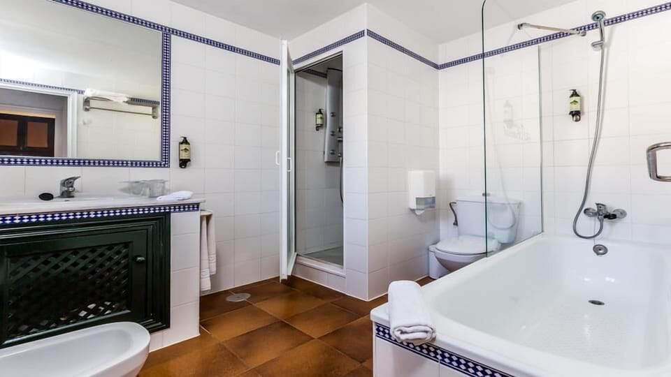 Classic Suite, Hill View | Bathroom | Combined shower/tub, hair dryer, bidet, towels