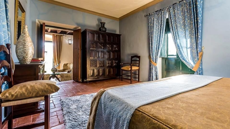 Classic Suite, Hill View | Minibar, in-room safe, travel crib, rollaway beds