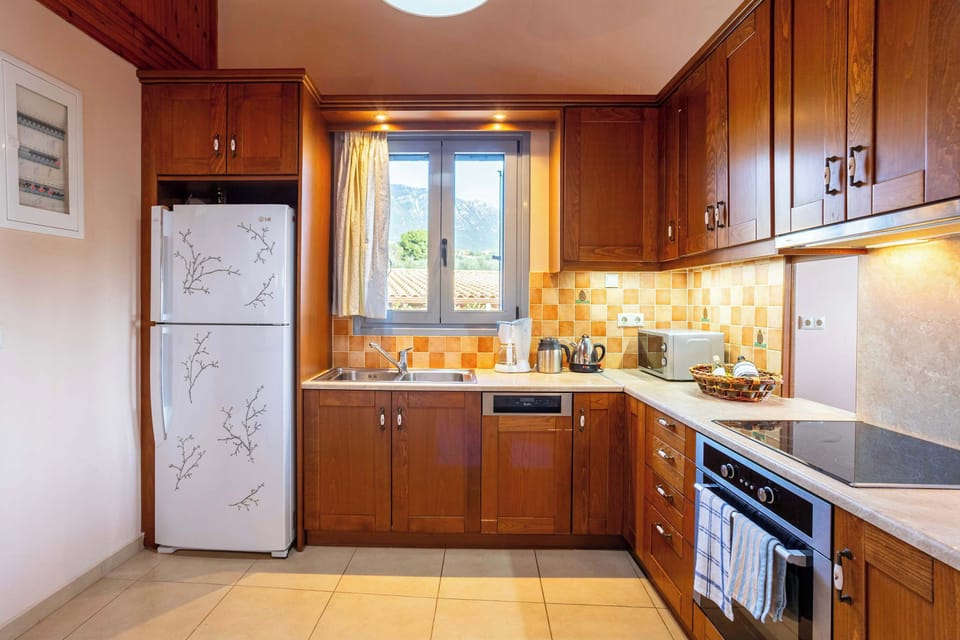 Kitchen space – Wooden cabinetry, practical layout

