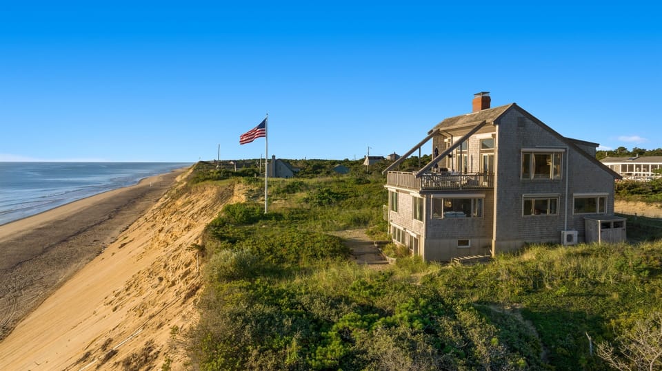Stonghold perched above it all—where the dunes fall away and the ocean stretches on.