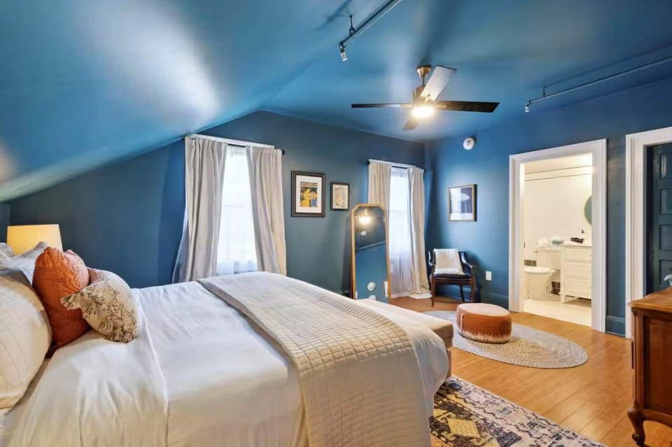 Large upstairs bedroom with a king bed, and full adjoining bathroom.