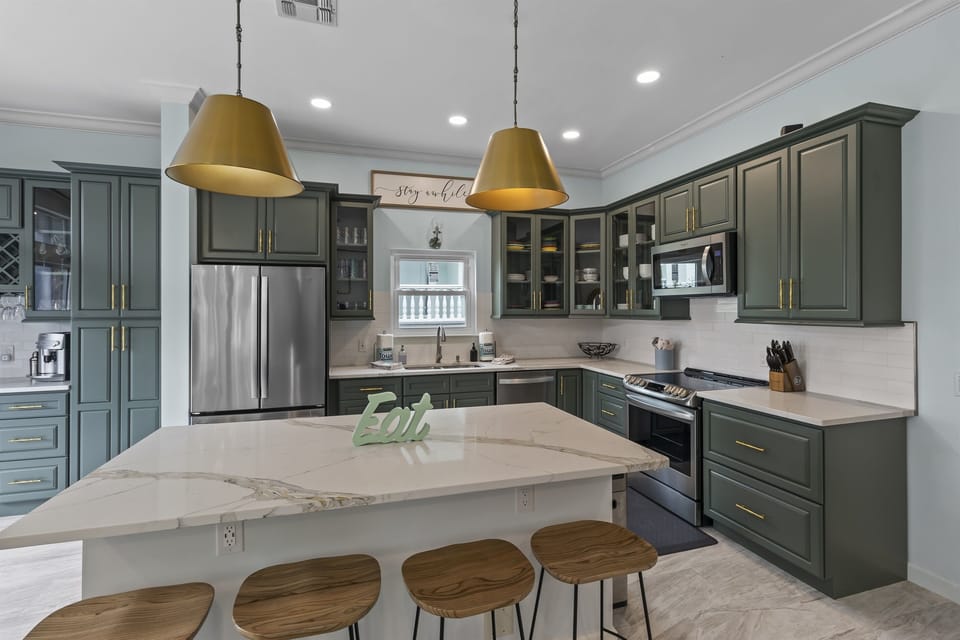 Grab a quick breakfast or snack on our marble top kitchen isle