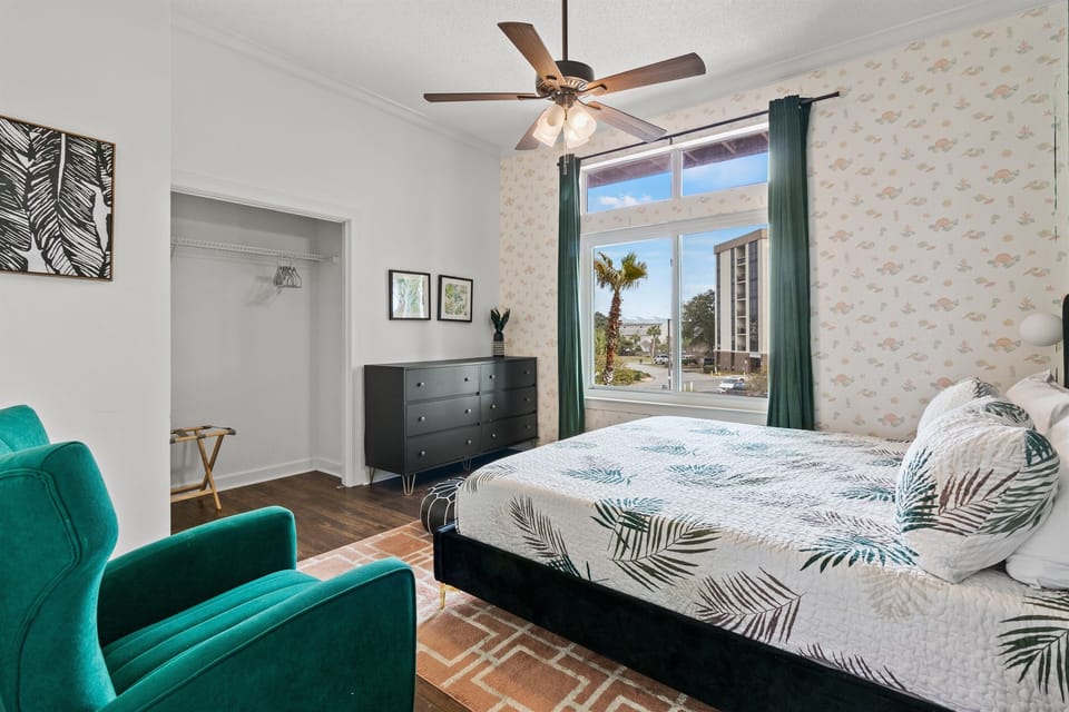 With a king sized bed, an ensuite bathroom and a walk-in closet