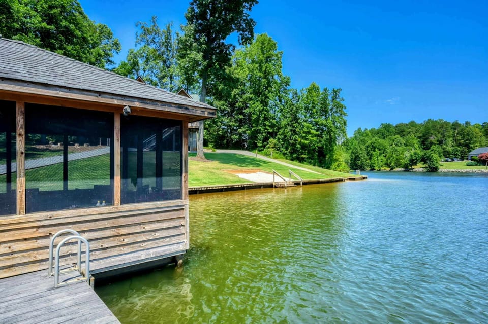 Beautiful lakefront boathouse with panoramic water views.