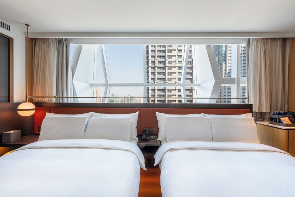 Deluxe Family Room-Deluxe Floor | Down comforters, in-room safe, blackout drapes, soundproofing