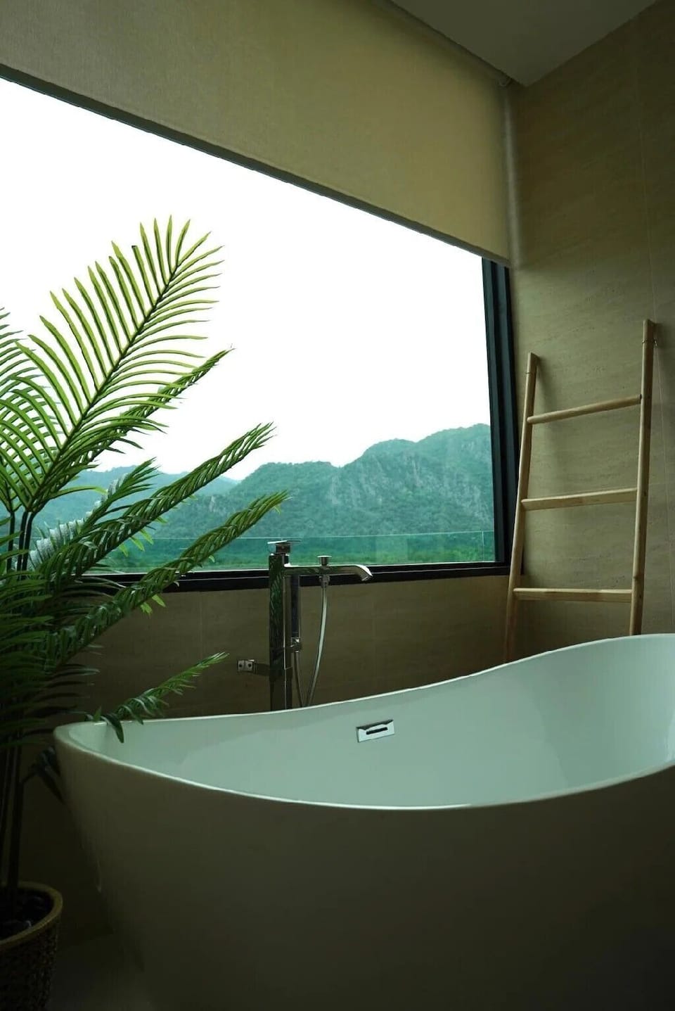 Separate tub and shower, rainfall showerhead, free toiletries