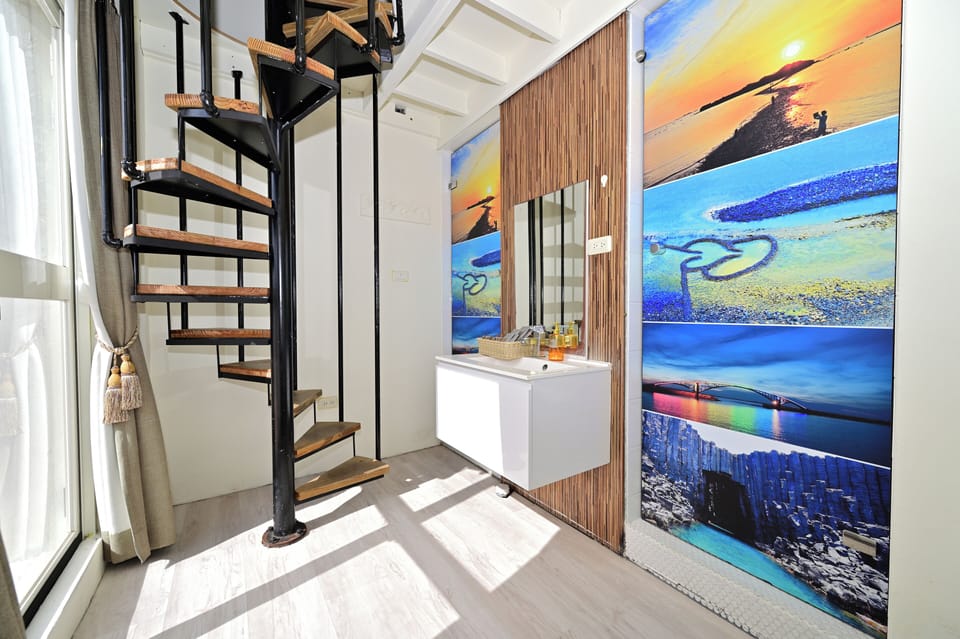 Deluxe Quadruple Room, Sea View | Individually decorated, laptop workspace, free WiFi