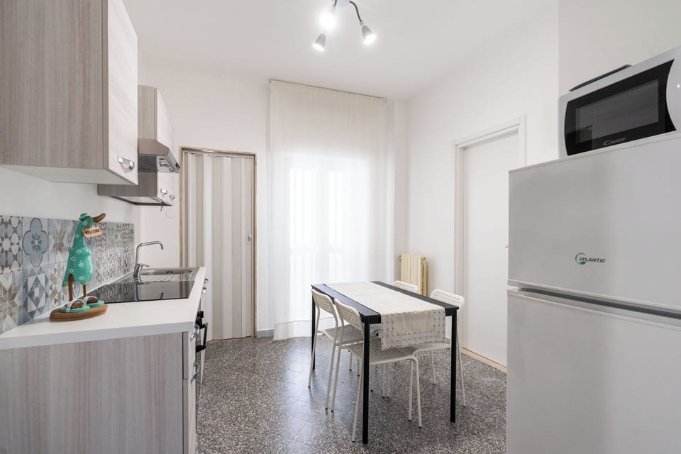 Apartment | Private kitchen | Electric kettle, dining tables