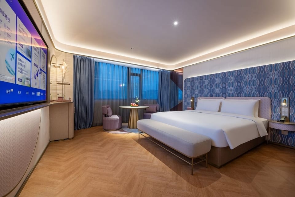 Senior Double Room, City View | Minibar (free items), desk, laptop workspace, soundproofing