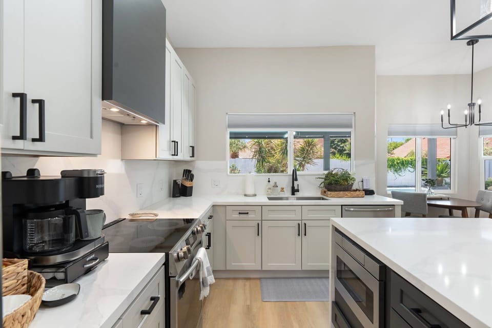 Bright and functional kitchen with premium appliances and ample storage.