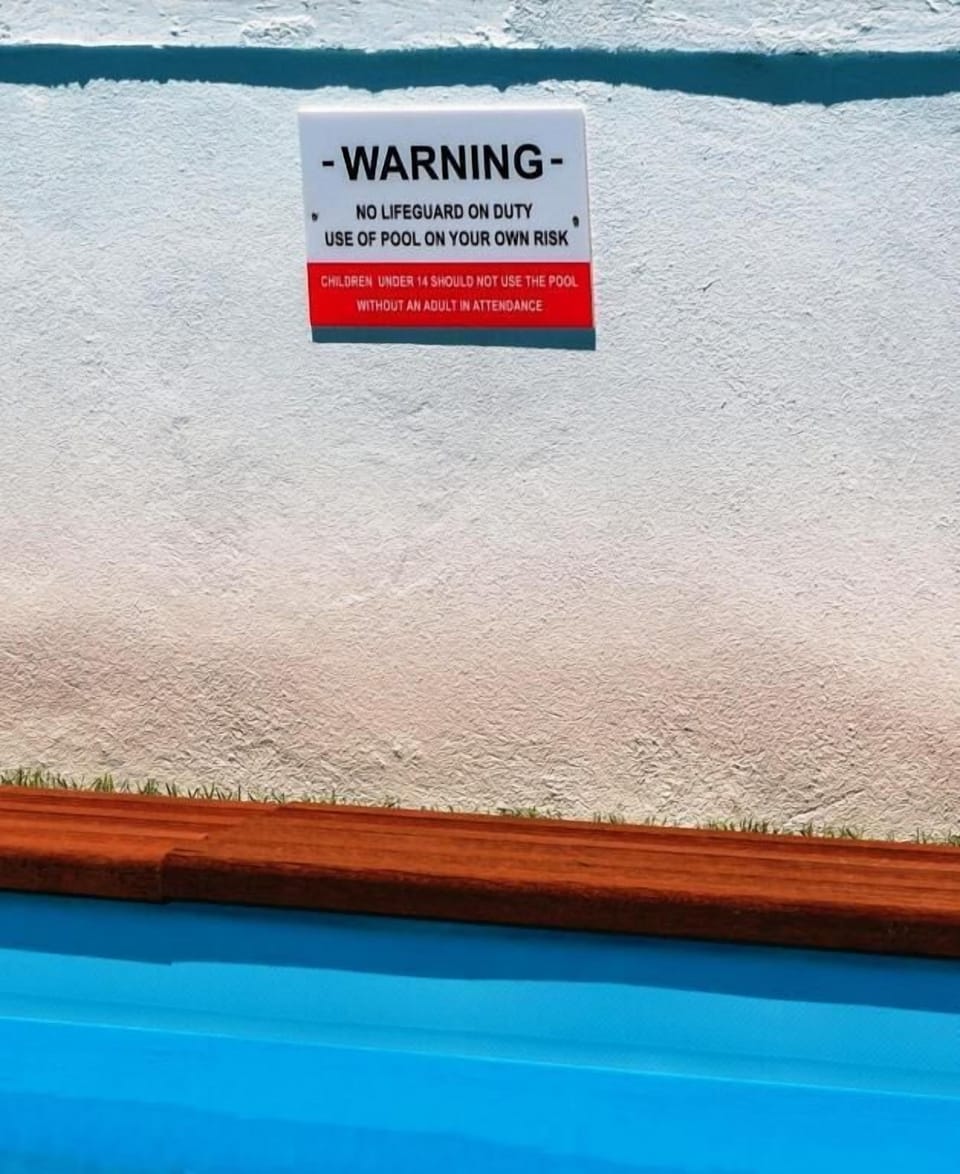 Seasonal outdoor pool, pool umbrellas, sun loungers