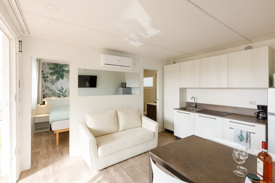 Premium Mobile Home, Patio | Living area | 43-inch Smart TV with satellite channels