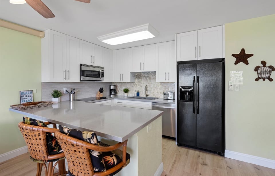 Condo, 2 Bedrooms | Private kitchen | Coffee/tea maker, fridge, oven, stovetop