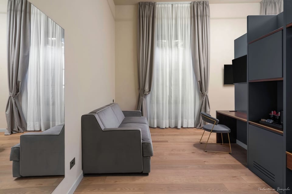 Classic Quadruple Room | Hypo-allergenic bedding available, in-room safe, desk, blackout drapes