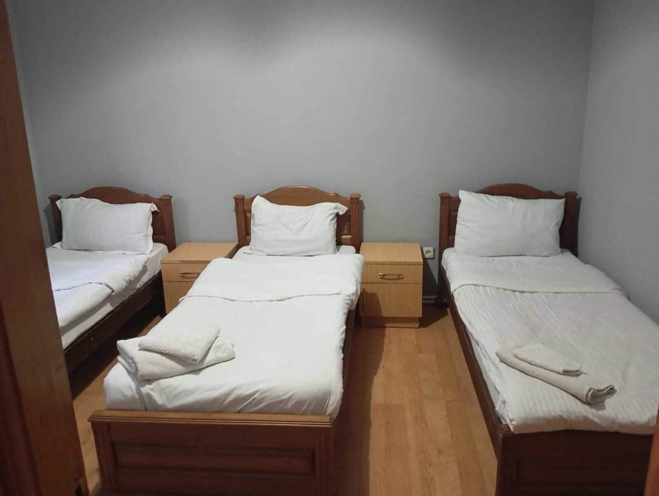 Classic Quadruple Room, City View | Desk, soundproofing, free WiFi