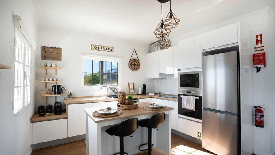 Discover the sleek, fully equipped kitchen at Ozeanica Heights by LovelyStay, blending modern design with functionality for a perfect cooking experience. #ozeanica #details
