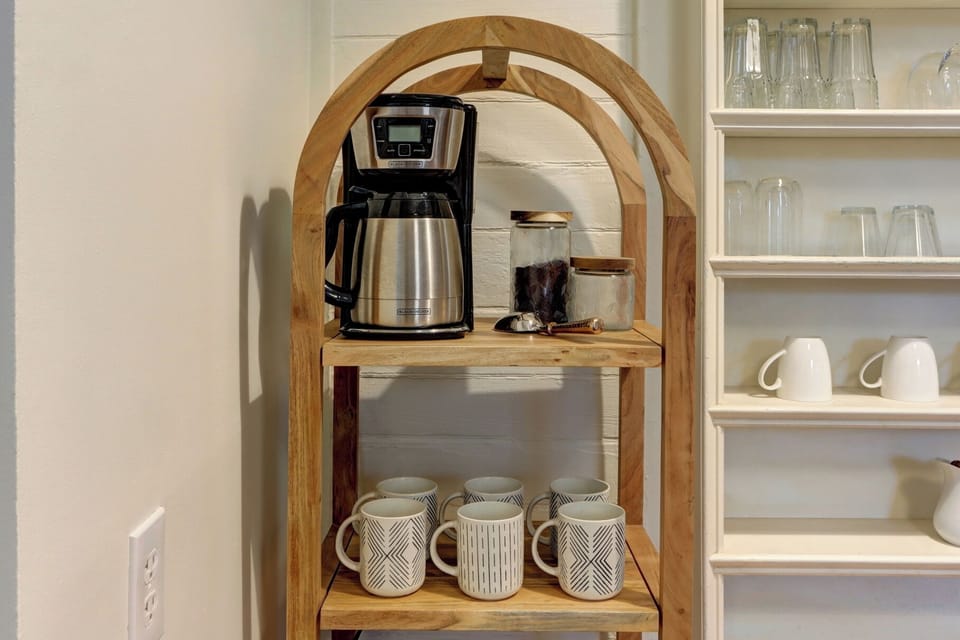 Coffee Station with coffee, filters, sugar and tea.