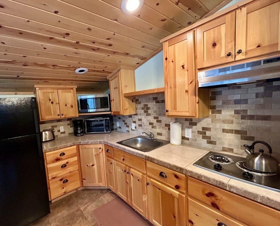 Cook up hearty meals in the fully stocked kitchen.