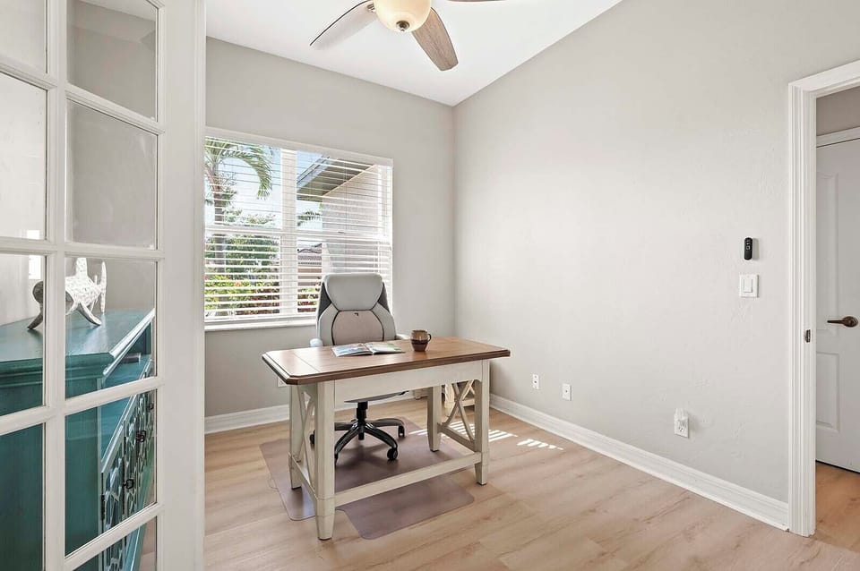 Designated Office with Garden View Allows  You To Check on Work or Emails.