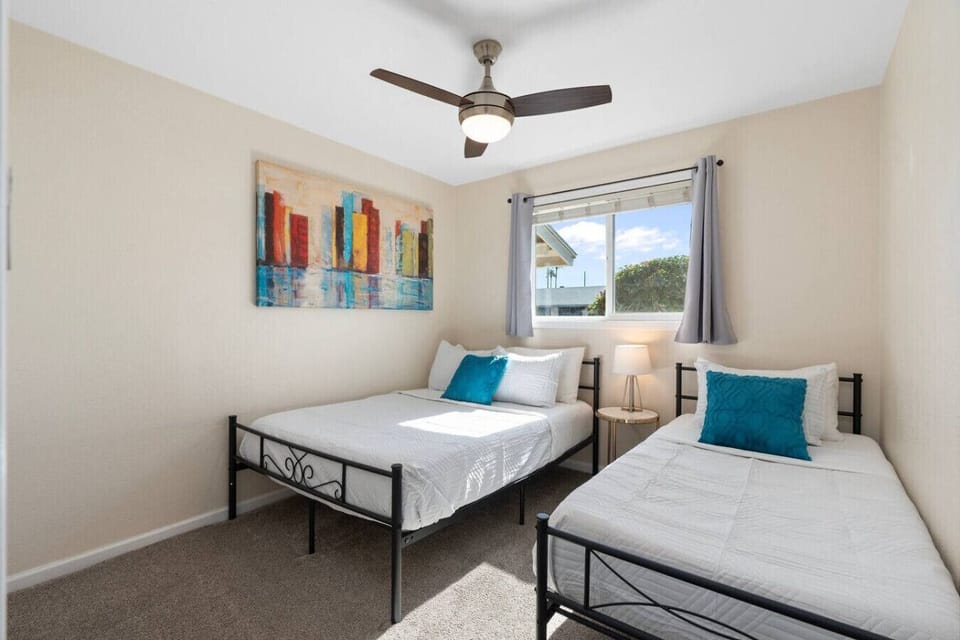Ideal for friends or kids, this room offers two comfortable beds and plenty of natural light.