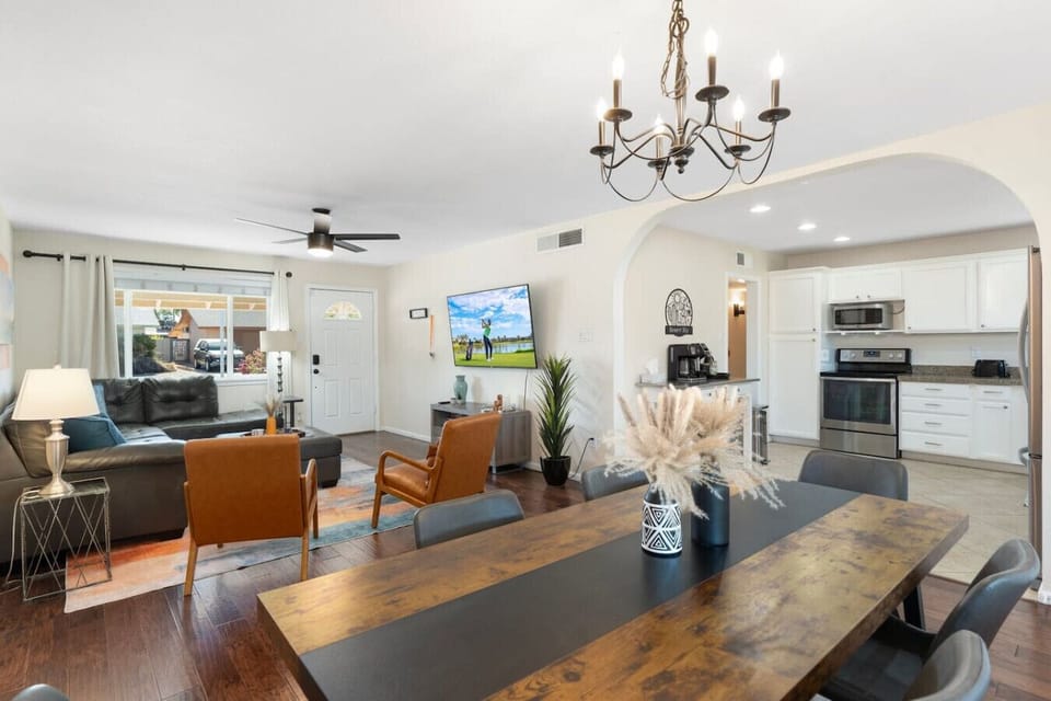 The living, dining, and kitchen areas flow together, making it easy to gather without missing a moment.
