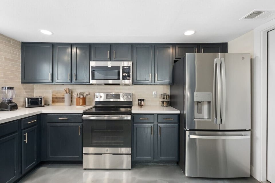 Fully equipped kitchen with modern appliances and everything needed to prepare meals at home.
