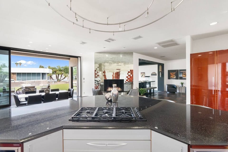 Gather around the kitchen while staying connected to the patio, lawn, and inviting lounge spaces.