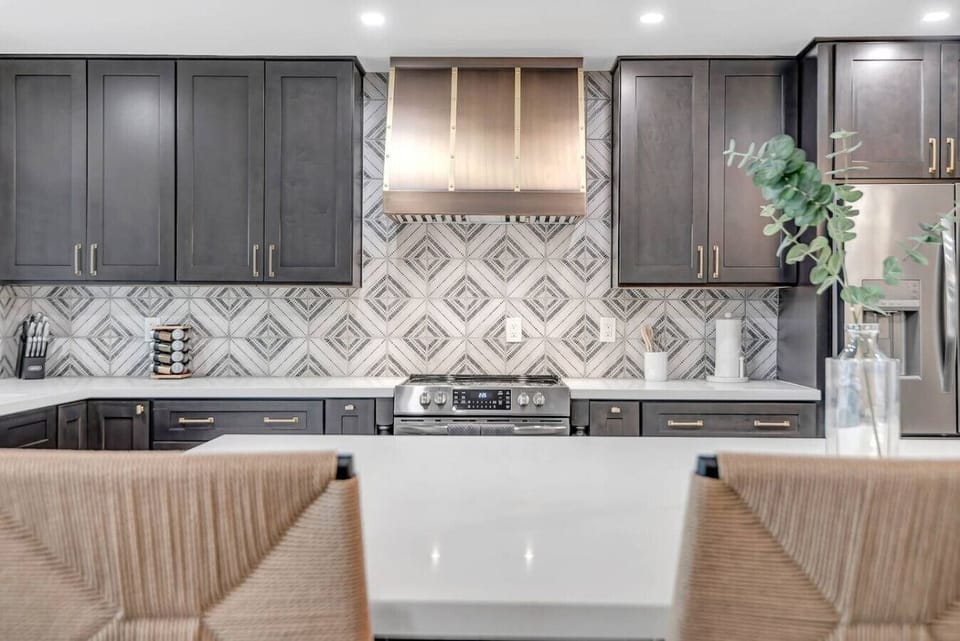 A designer kitchen stocked and ready for everything from quick breakfasts to family feasts.