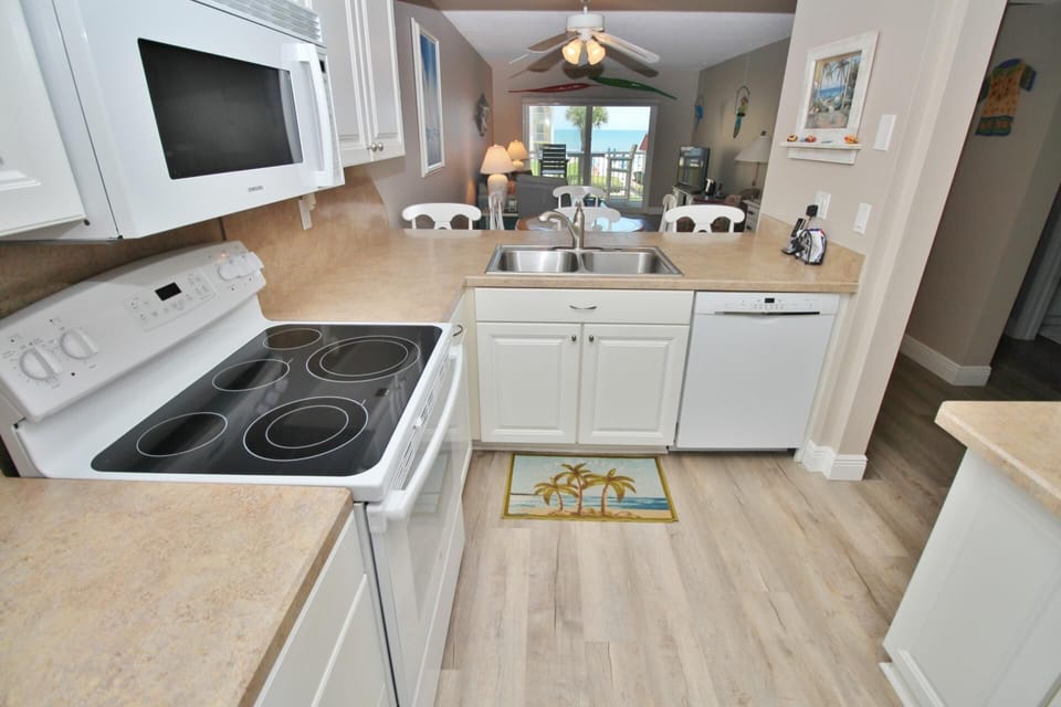 Condo, 1 King Bed with Sofa bed (Point East 213) | Private kitchen | Oven, toaster