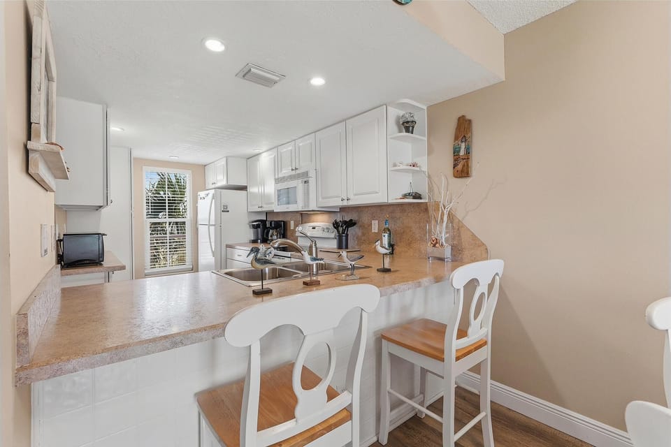 Condo, 1 King Bed with Sofa bed (Point East 213) | Private kitchen | Oven, toaster