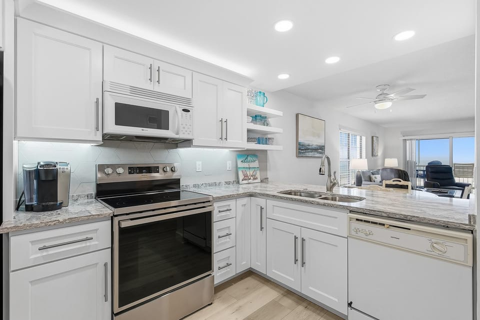 Condo, 1 King Bed with Sofa bed (Point East 301) | Private kitchen | Oven, coffee/tea maker, toaster, blender