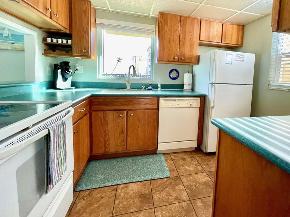 Condo, 1 King Bed with Sofa bed (Sea Coast Gardens III 101) | Private kitchen | Oven, toaster