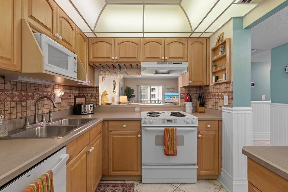 Condo, 1 King Bed (Sea Coast Gardens III 207) | Private kitchen | Oven, toaster