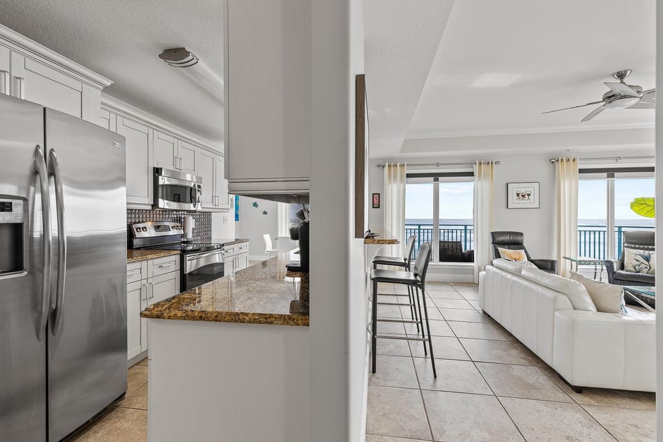 Condo, Multiple Beds (The Wave 302) | Private kitchen | Oven