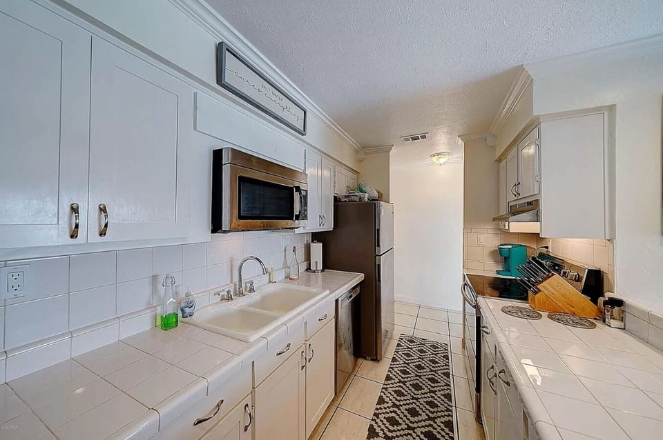 Kitchen with large counter space and cabinets