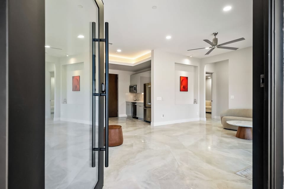 Step into the home through the glass door and be greeted with immediate breathtaking views.