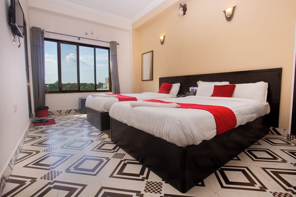Deluxe Room, 1 Bedroom, Non Smoking, Garden View | Laptop workspace, iron/ironing board, free WiFi, bed sheets